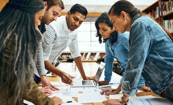 a decorative element: a group of young people at work