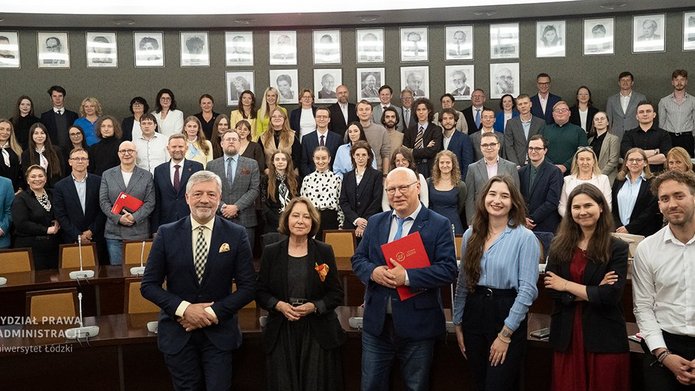  a group of people in an academic hall - 25th Anniversary of the UniLodz Law Clinic