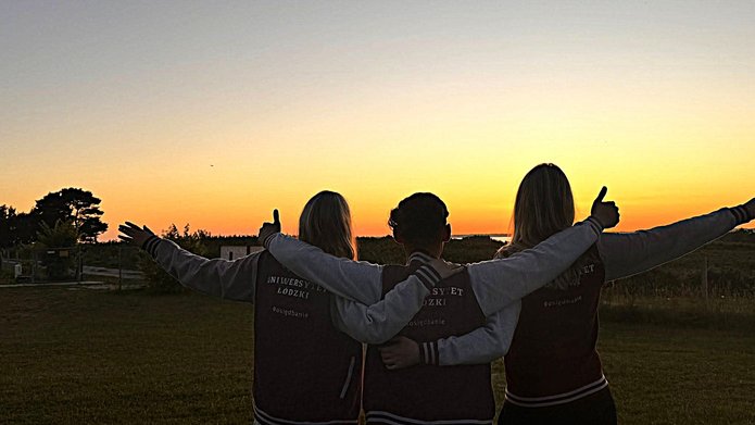 sailing camp participants in the university sweatshirts