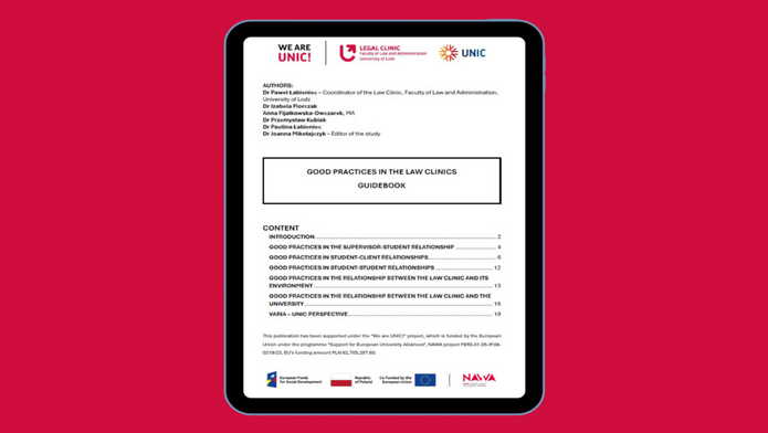 Tablet na malinowym tle.