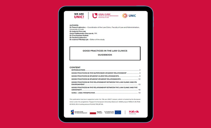 Tablet na malinowym tle.