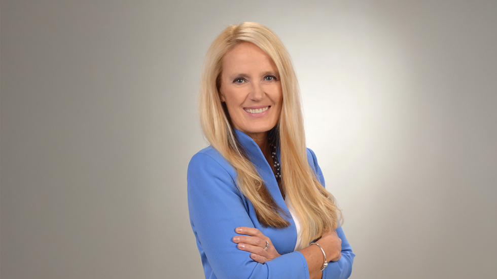 Naukowczyni w niebieskim żakiecie